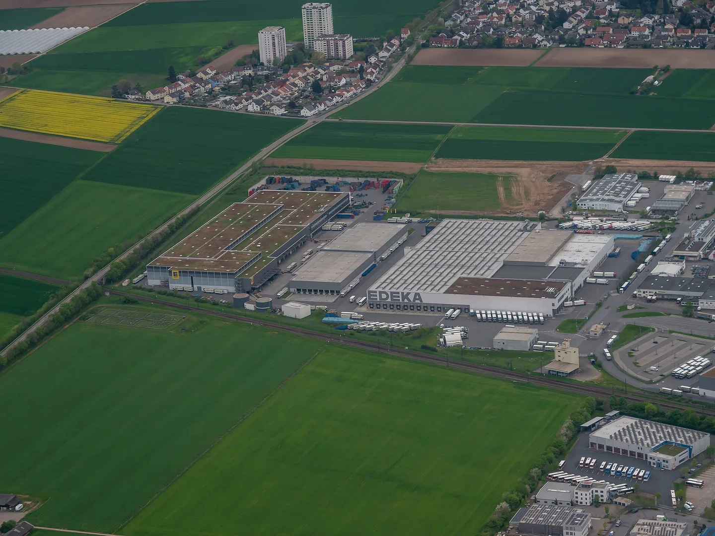 Distribution centre and vehicle yards surrounded by farmland