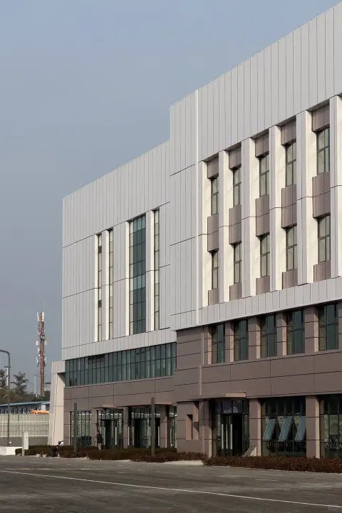 White distribution centre corner with tall windows