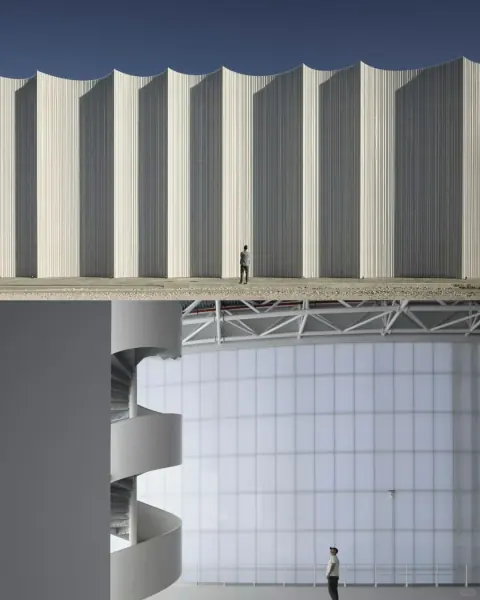 Paired architectural views of a translucent industrial facade