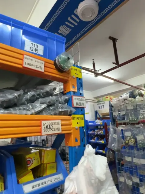 Close view of warehouse rack beams and labelled picking locations