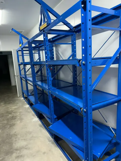 Close view of blue industrial warehouse shelving